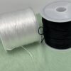 Bobines de fil élastique blanc et noir multi brins pour création de bijoux