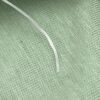 Gros plan sur la texture du fil élastique multi brins translucide 0,6 mm
